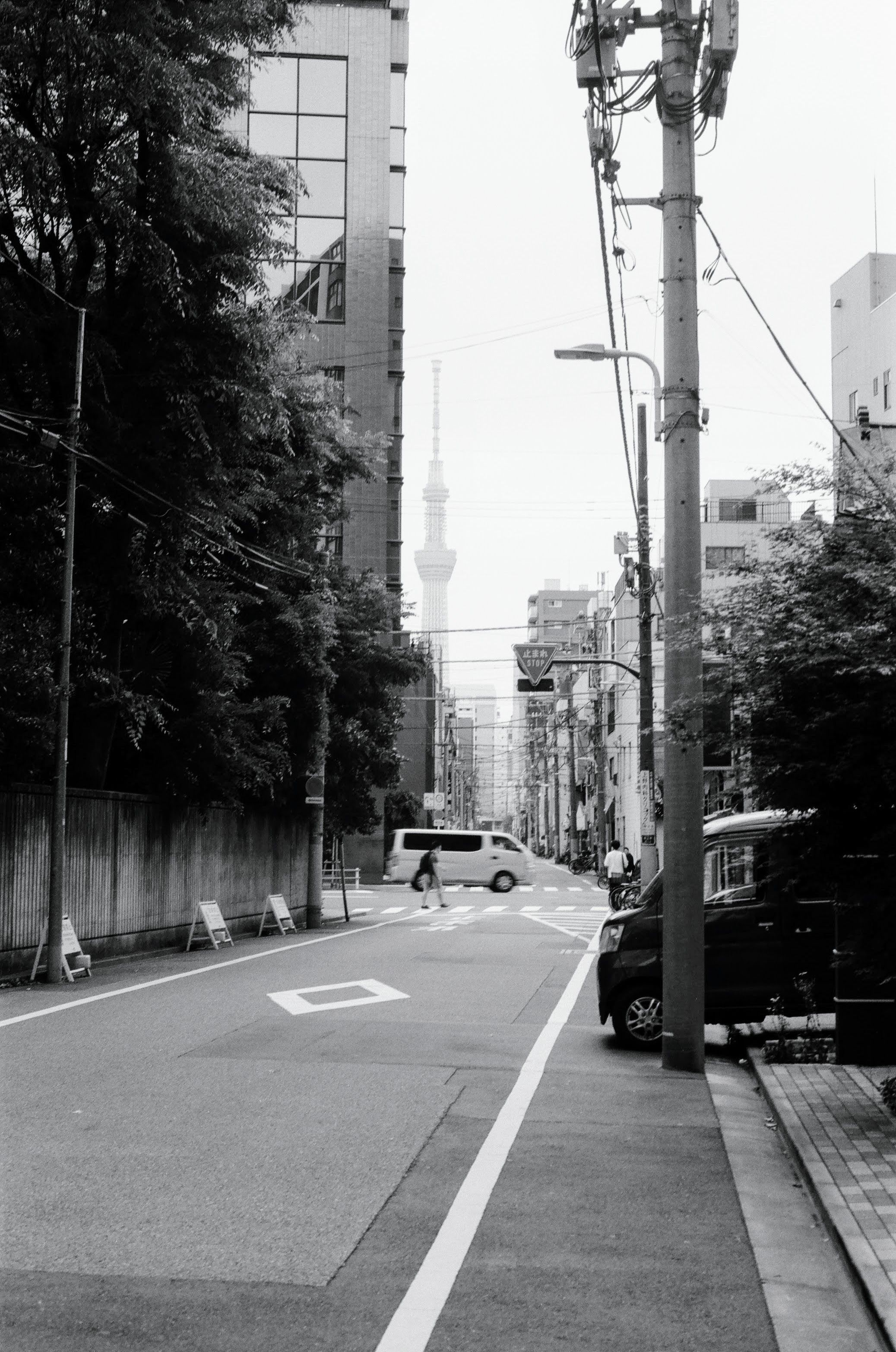 A Japanese back street looking towards the Tokyo Sky Tree in the distance.